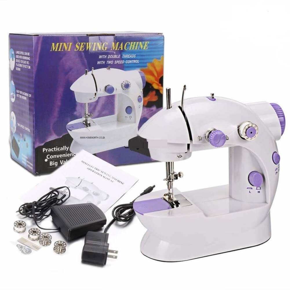 Mini sewing machine with accessories and packaging on a white background