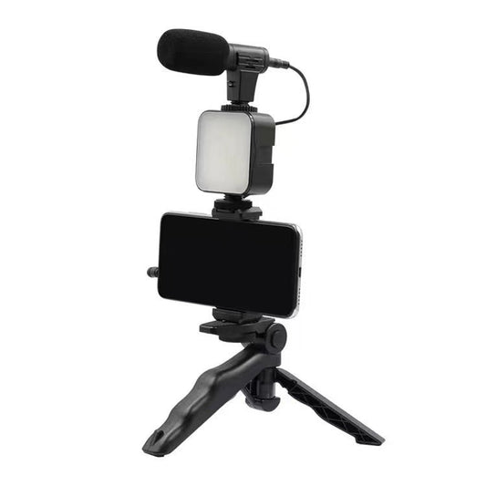 Phone holder with microphone and light on a white background